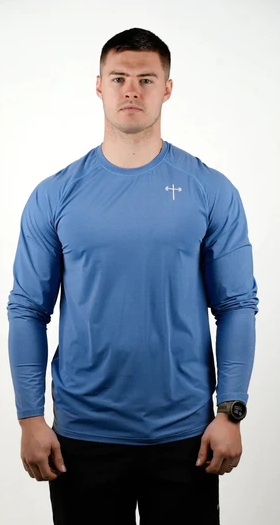 A man wearing a HolStrength lightweight long sleeve tee - light blue