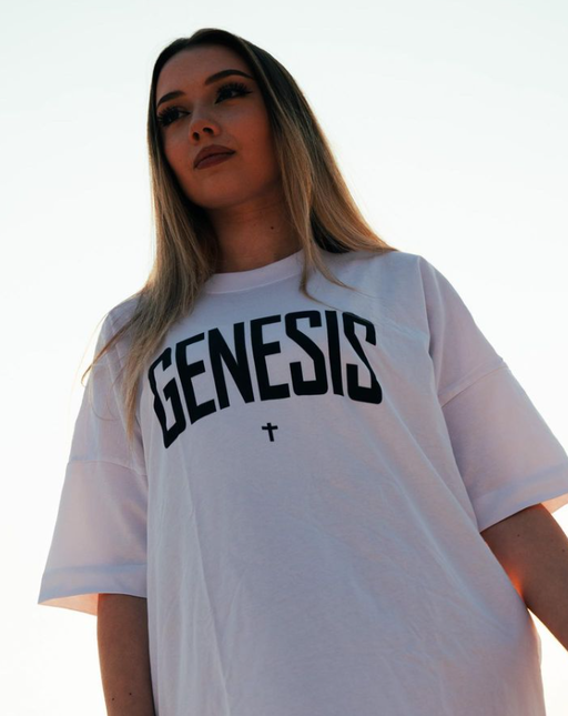 A woman wearing a Genesis Clothing white t-shirt