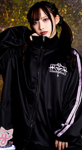 A woman wearing a Dreamy Bows addictive akuma devil black jersey jacket