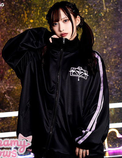 A woman wearing a Dreamy Bows addictive akuma devil black jersey jacket