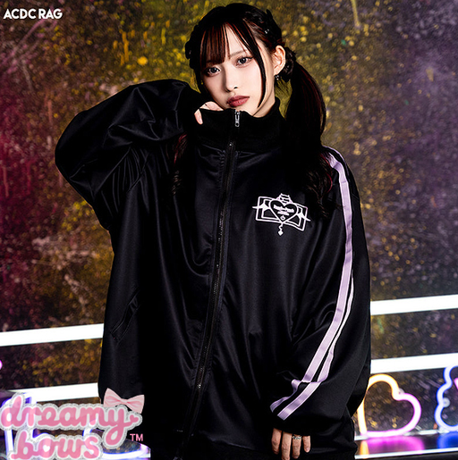 A woman wearing a Dreamy Bows addictive akuma devil black jersey jacket