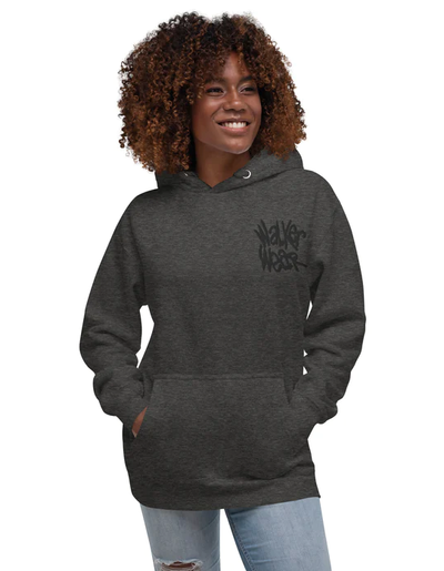 A woman wearing a Walker Wear charcoal grey ww sweatpants