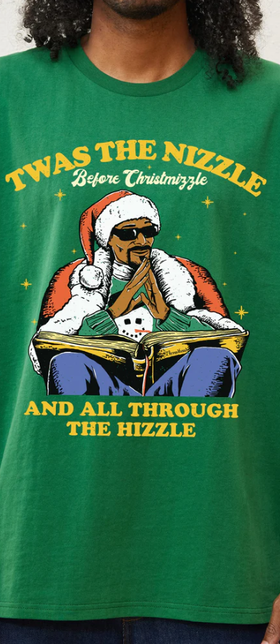 A man wearing a Threadheads green christmizzle dogg t-shirt