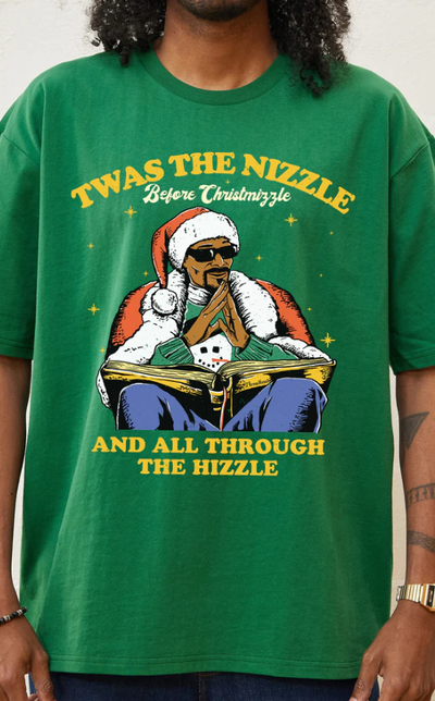 A man wearing a Threadheads green christmizzle dogg t-shirt