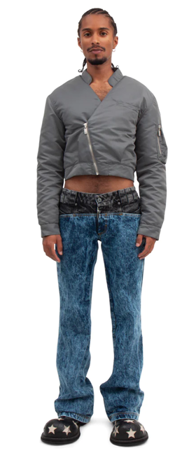 A man wearing a BARRAGÁN gun metal gray crop bomber blazer