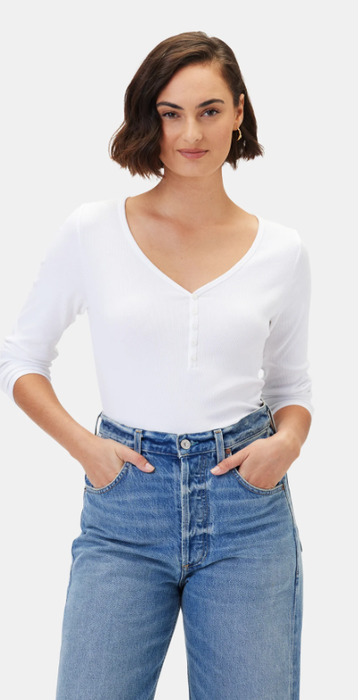 A woman wearing a Amour Vert deacon baby rib white tee