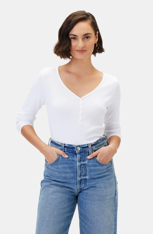 A woman wearing a Amour Vert deacon baby rib white tee