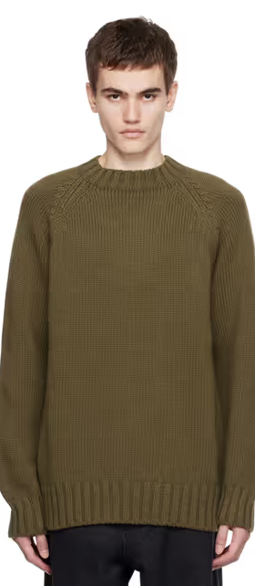 A man wearing a 3MAN khaki raglan sweater