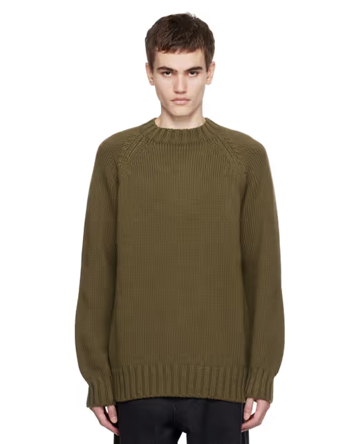A man wearing a 3MAN khaki raglan sweater