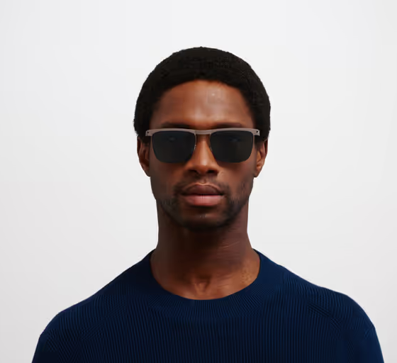 A man wearing a MYKITA Eyewear ocean blue sunglass