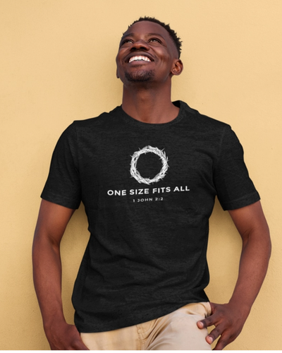 A man wearing a Fabrics of Faith black t-shirt