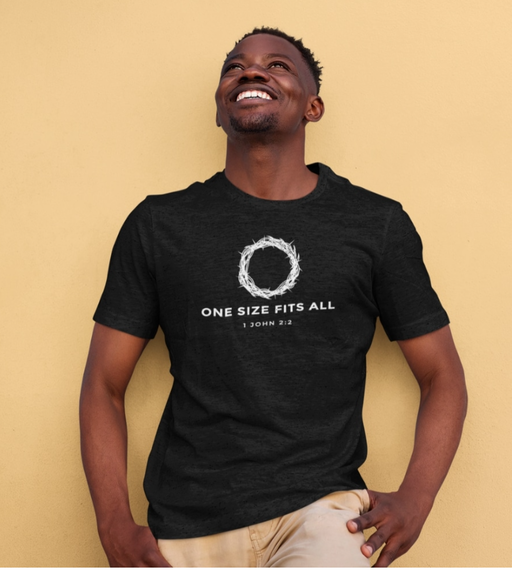 A man wearing a Fabrics of Faith black t-shirt