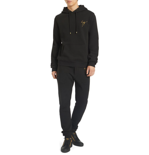 A man wearing a Giuseppe Zanotti black hoodie