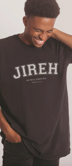 A man wearing a Salt and Honey Clothing black t-shirt