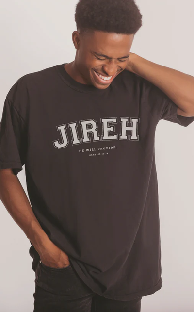 A man wearing a Salt and Honey Clothing black t-shirt