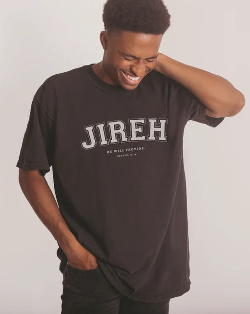 A man wearing a Salt and Honey Clothing black t-shirt