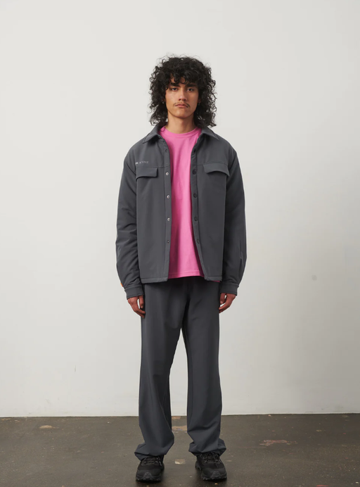 A man wearing a 7 DAYS Active  ebony grey tech padded overshirt
