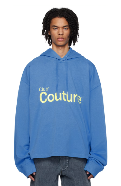 A man wearing a ANONYMOUS CLUB blue bonded hoodie