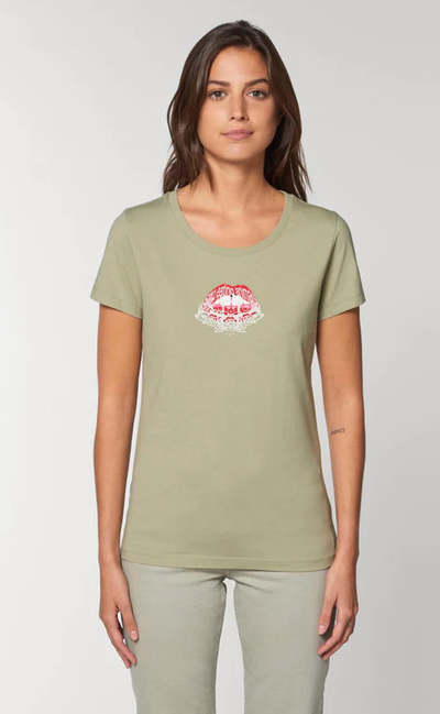 A woman wearing a Plant Faced sage color t-shirt