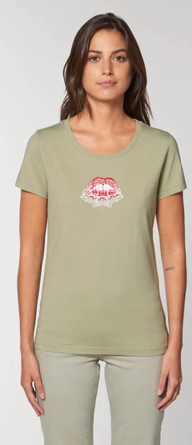 A woman wearing a Plant Faced sage color t-shirt