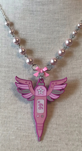 A picture of magical first aid thermometer necklace