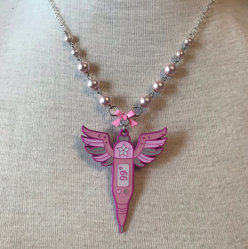 A picture of magical first aid thermometer necklace