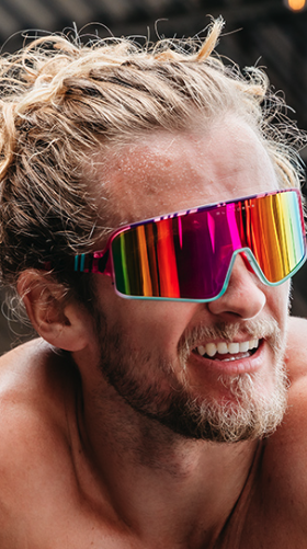 A man wearing a colorful pair of Blenders sunglasses