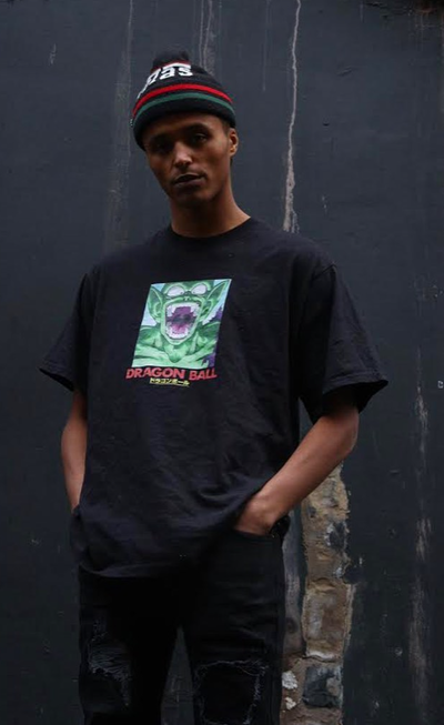 A man wearing a 6Portals black t-shirt