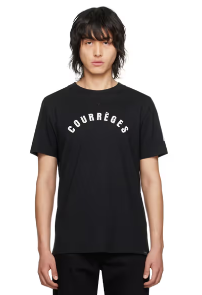 A man wearing a Courrèges black ac straight t-shirt