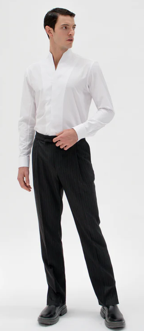 A man wearing white chimney shirt