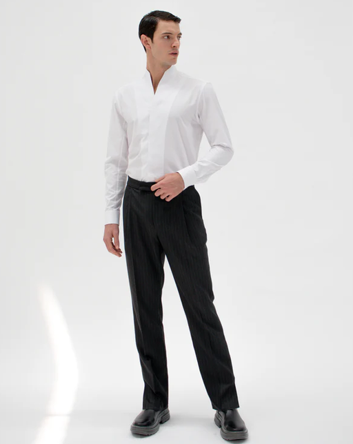 A man wearing white chimney shirt