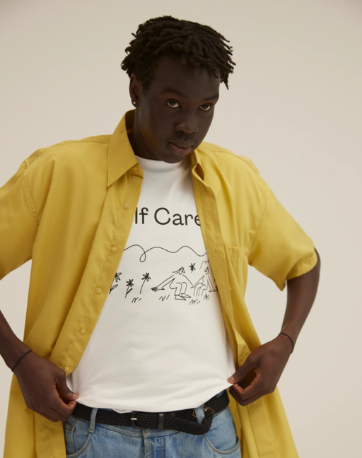 A man wearing white t-shirt