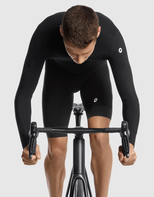 A man wearing black cycling jersey