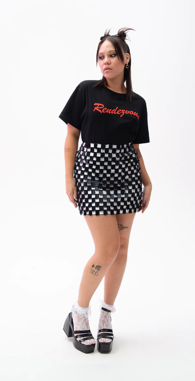 A woman wearing black rendezvous t-shirt