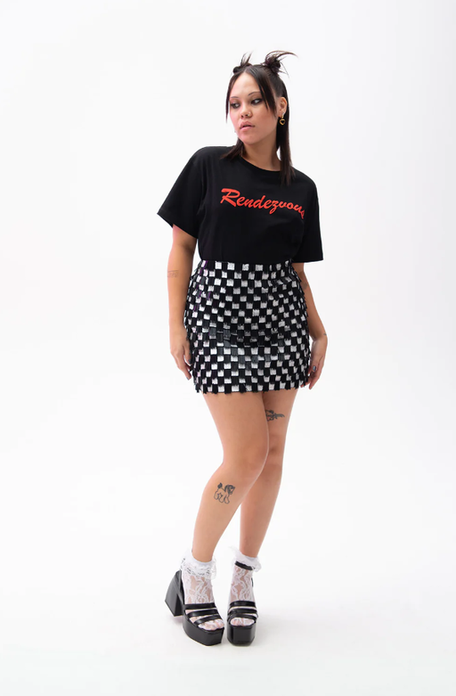 A woman wearing black rendezvous t-shirt