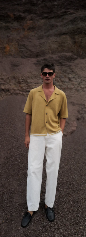 A man wearing tan merino wool s/s Charlton shirt