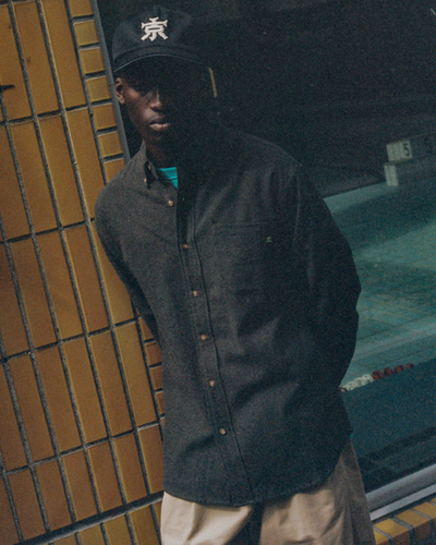 A man wearing l/s botton down collar shirt