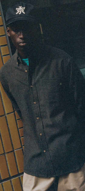 A man wearing l/s botton down collar shirt