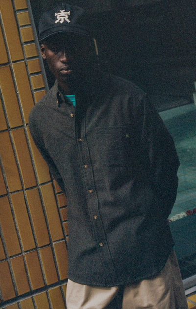 A man wearing l/s botton down collar shirt