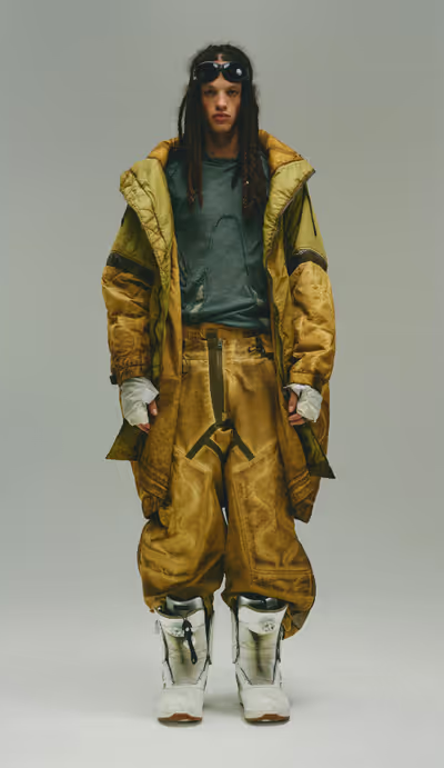 A man wearing cargo specialist anti-magnetic quilted coat