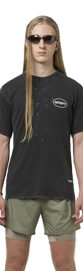 A man wearing black mothtech™ t‑shirt