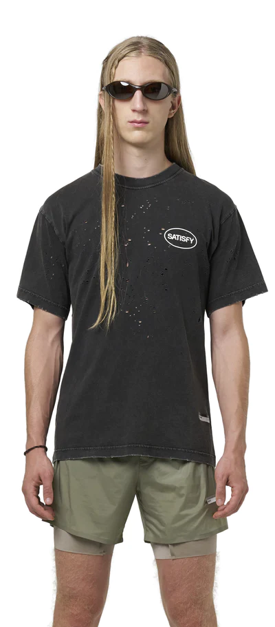 A man wearing black mothtech™ t‑shirt