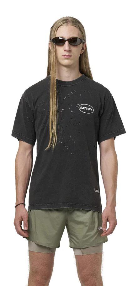 A man wearing black mothtech™ t‑shirt