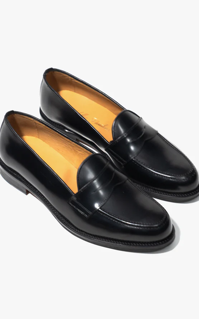 An image of pair of “tony” black shoe