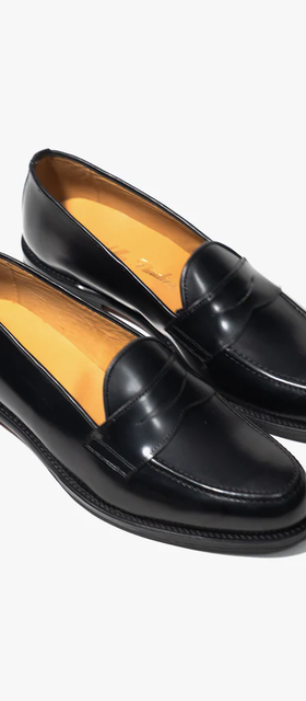 An image of pair of “tony” black shoe