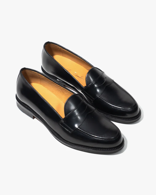 An image of pair of “tony” black shoe