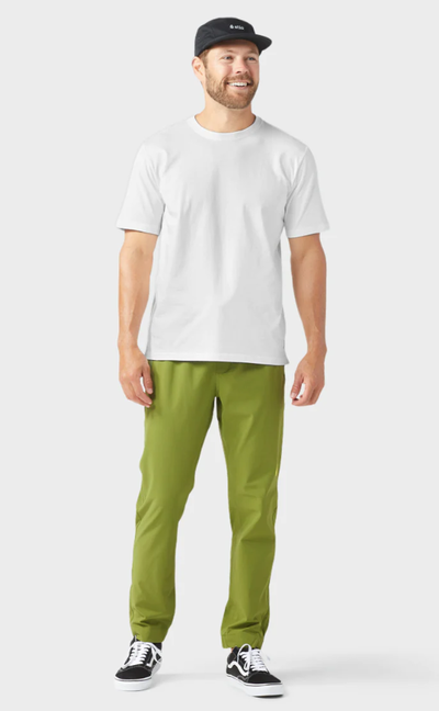 A man wearing morning frost men's whitebark tee