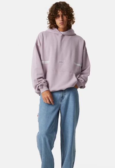 A man wearing terminate toadstool oversized hoodie