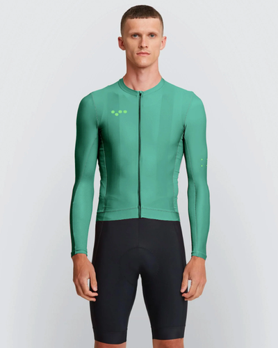 A man wearing veridian color training ls jersey