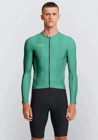 A man wearing veridian color training ls jersey